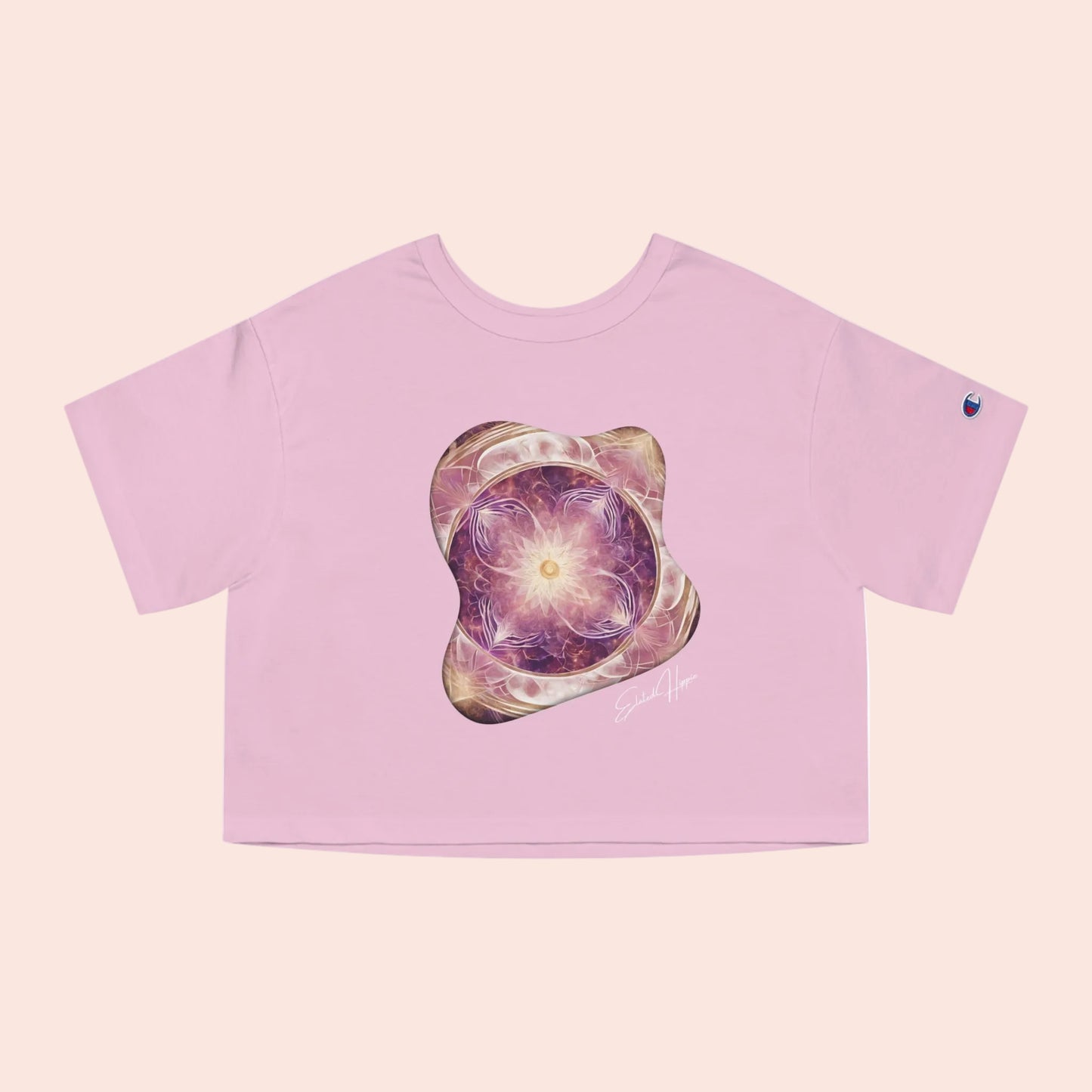 Pink crop top with a colorful graphic design on a white background