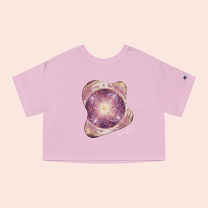 Pink crop top with a colorful graphic design on a white background