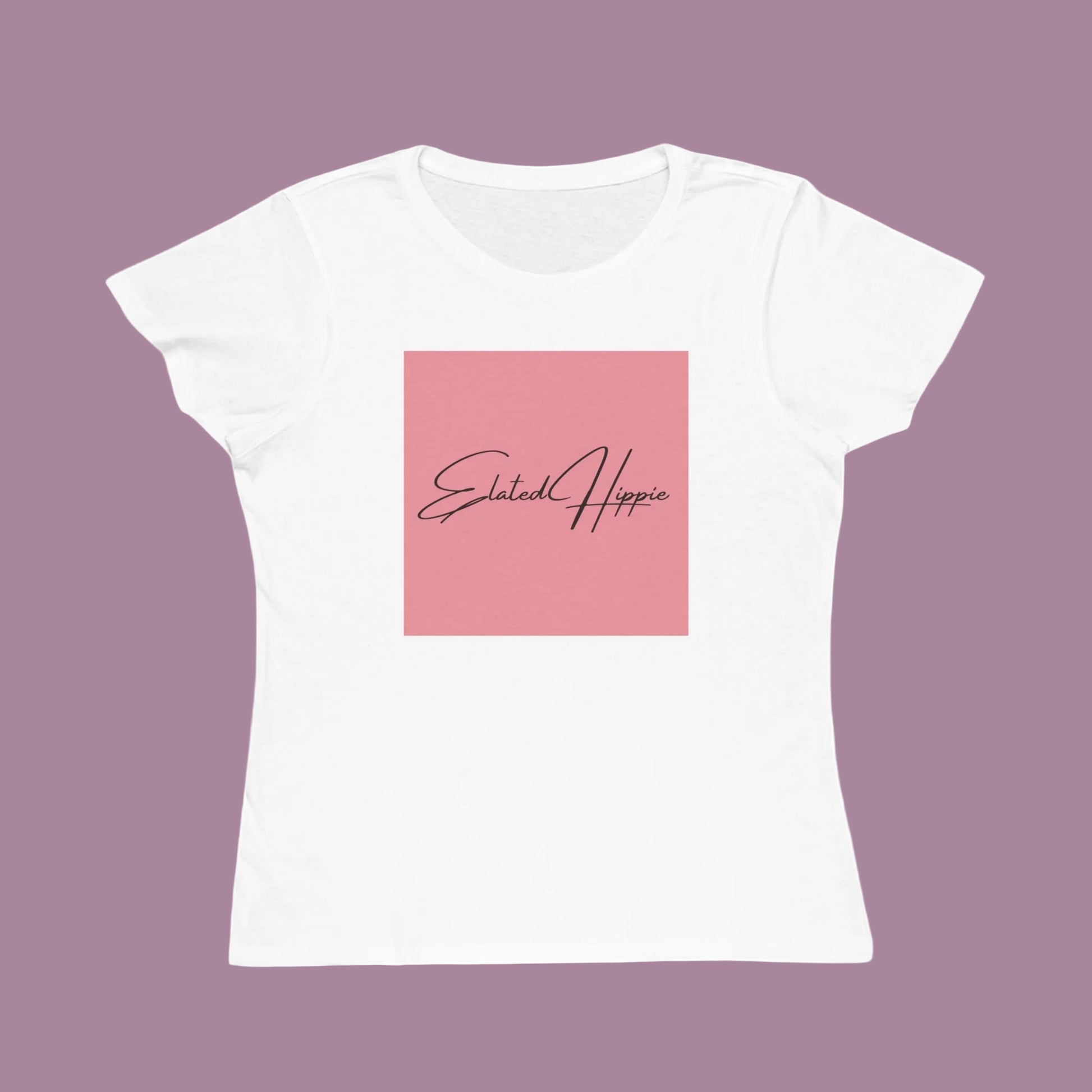 White t-shirt with a pink square featuring 'Elated Hippie' text on a white background